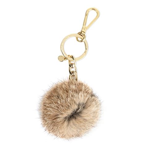 michael michael kors key charms fur pom pom 